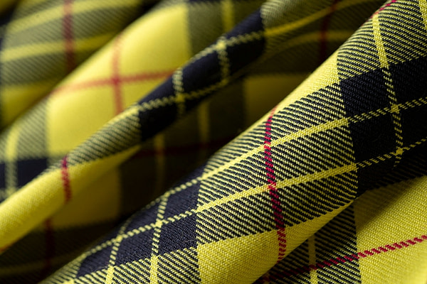 Tartan fabric in pure wool in shades of yellow and black | new tess