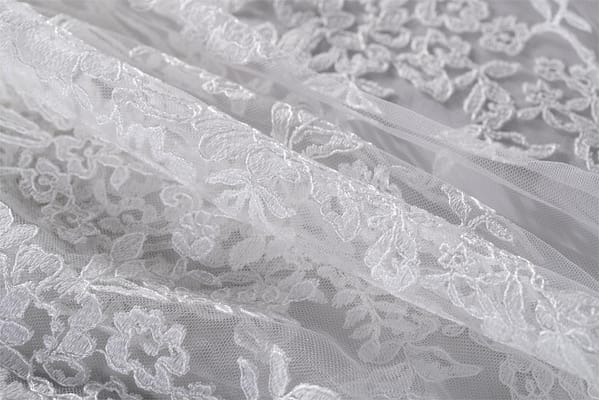 White embroidered rebrodé tulle with scallop | new tess bridal fabrics