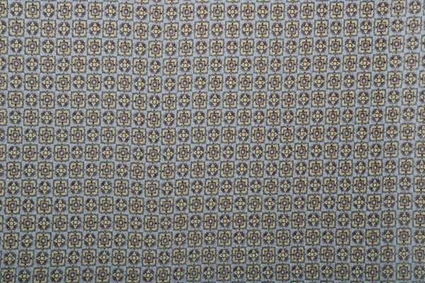 Beige silk crepon fabric with tie pattern