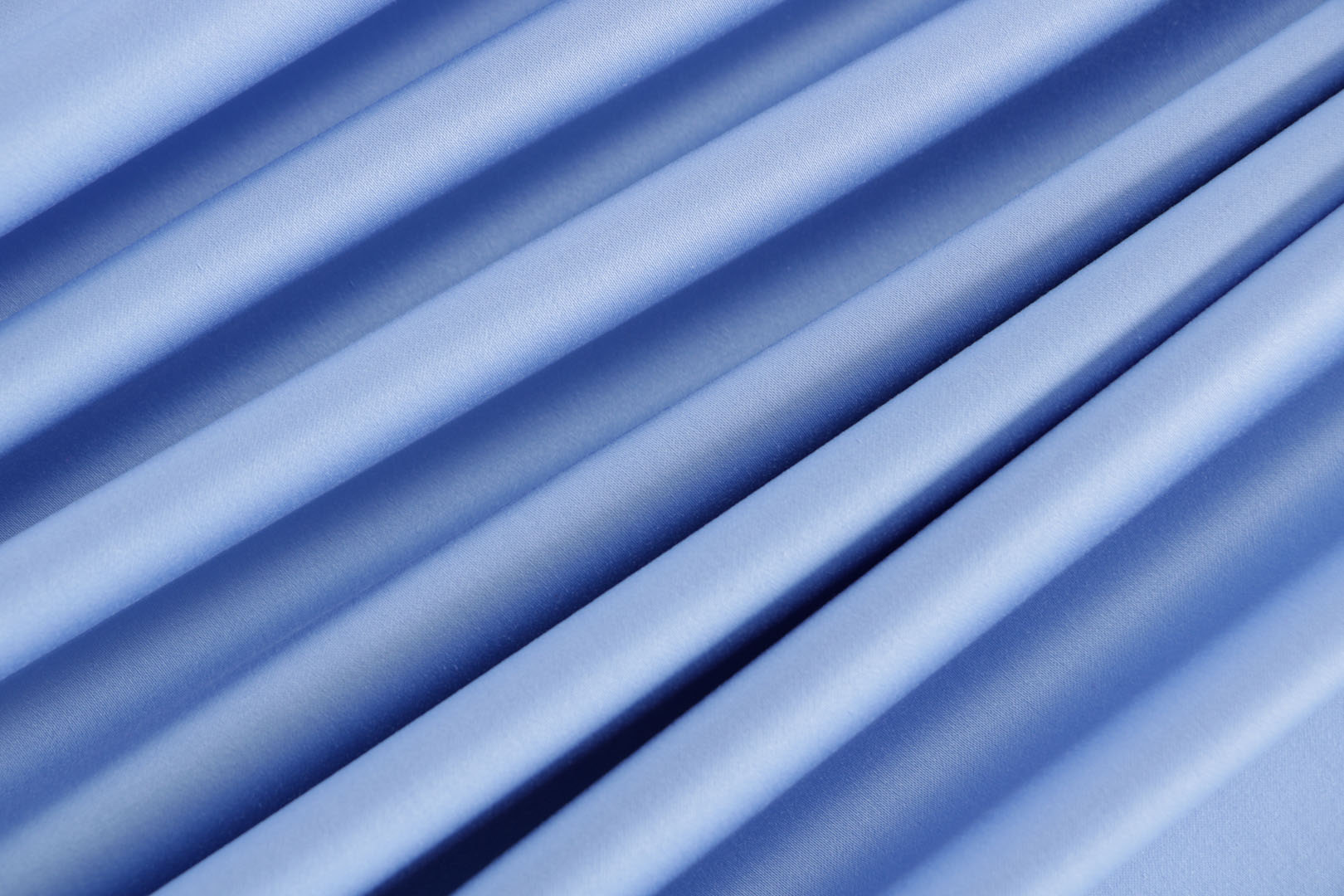 Light blue lightweight stretch cotton sateen fabric for dressmaking